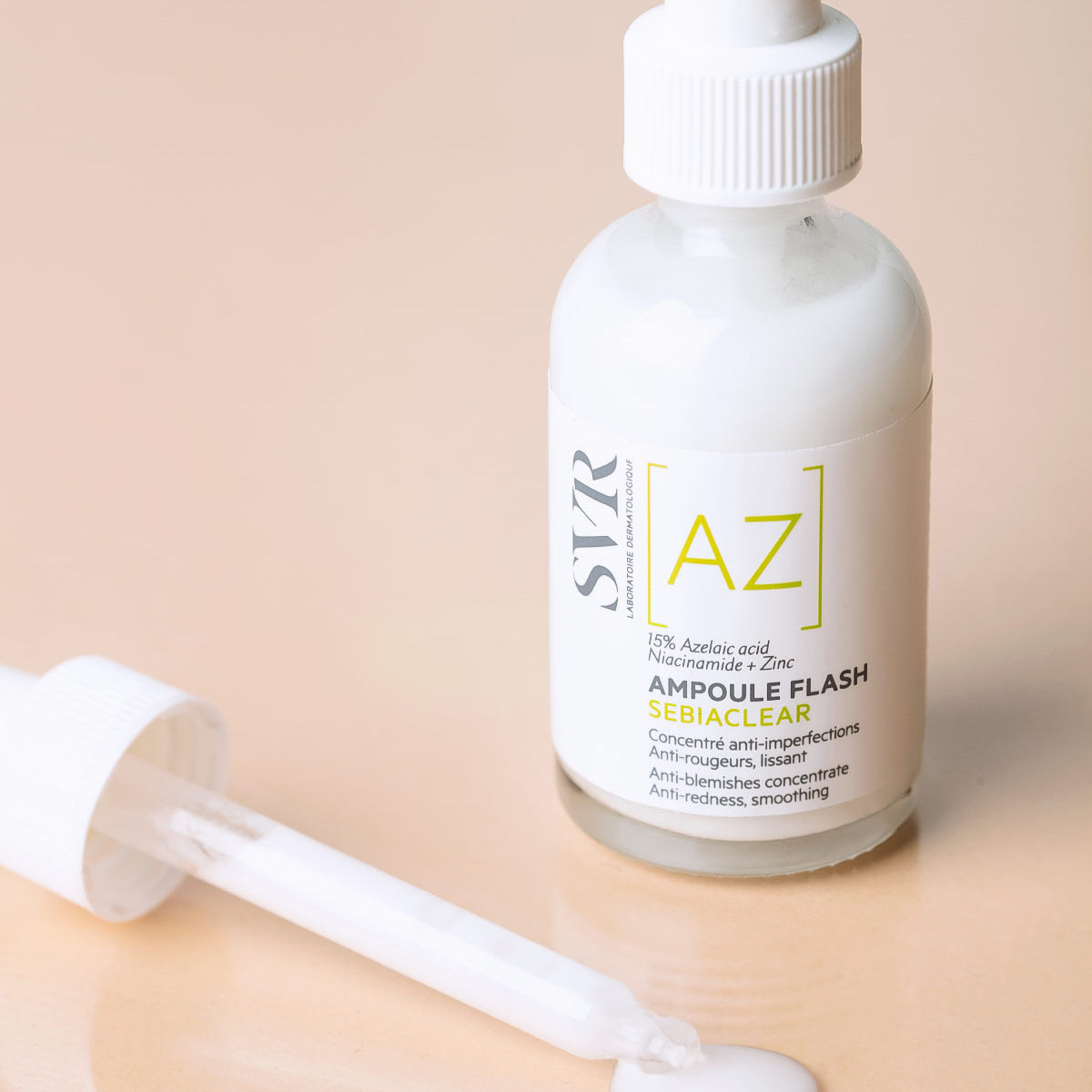 SVR Sebiaclear Ampoule Flash bottle with white dropper and label featuring AZ text on a beige background.