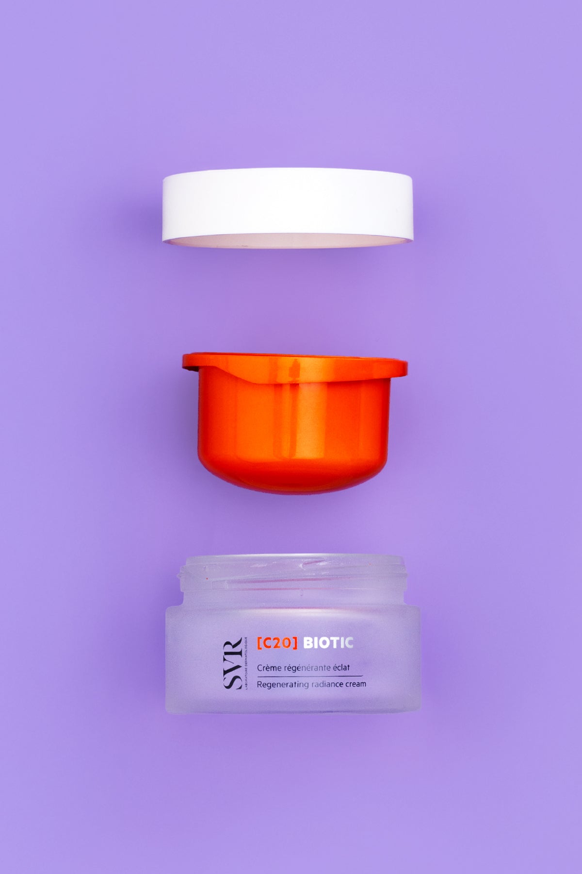 SVR C20 Biotic 50ml regenerating radiance cream in a frosted glass jar with an orange inner container and white lid.
