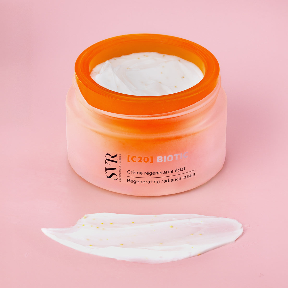 SVR [C20] Biotic 50ml regenerating radiance cream in an orange frosted glass jar with a white textured cream swatch.