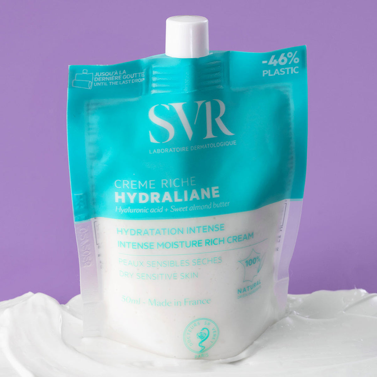 SVR Hydraliane Creme Riche 50ml refill pouch in teal and white, set against a purple background with cream texture.