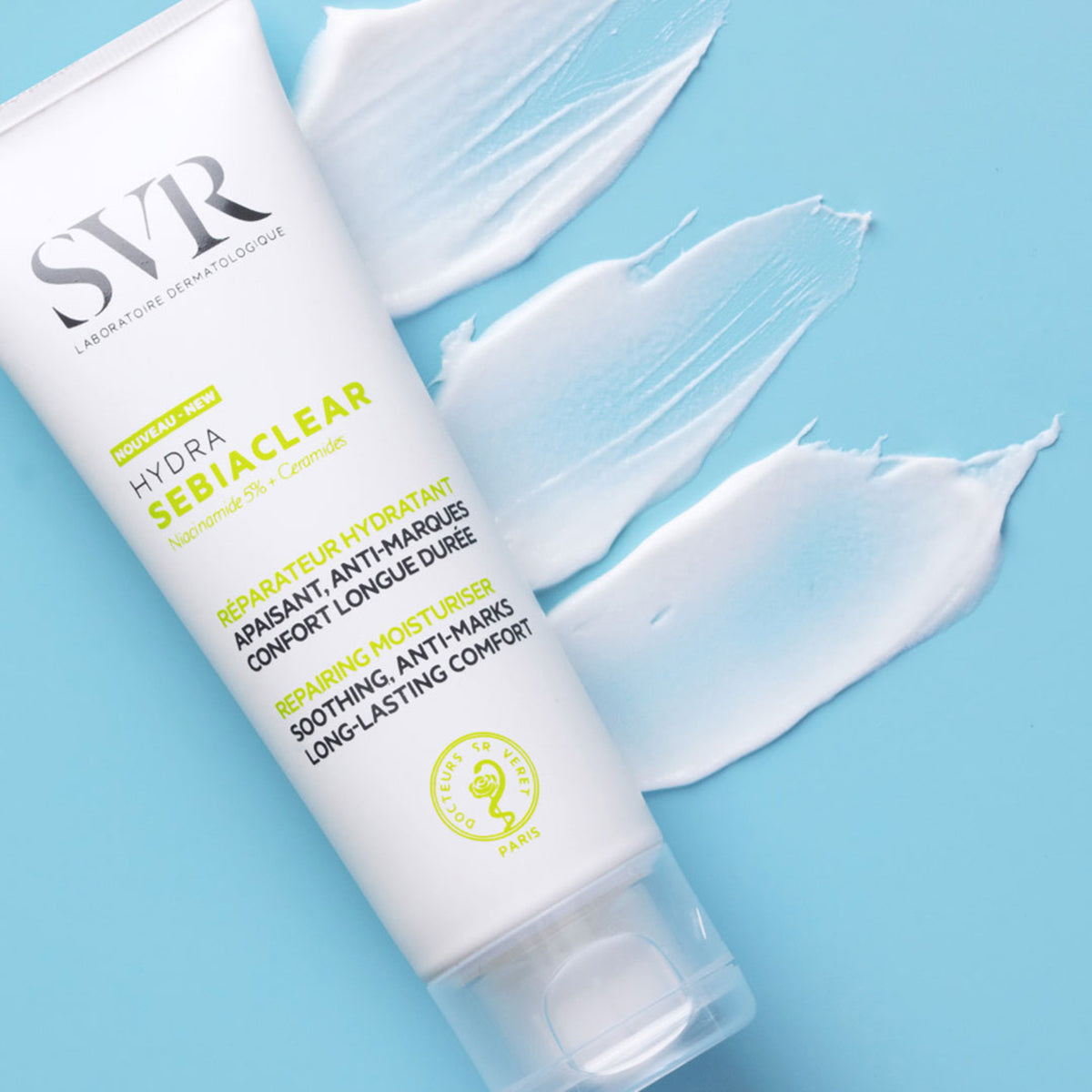 SVR Sebiaclear Hydra moisturizing cream tube with white product swatches on a light blue background.