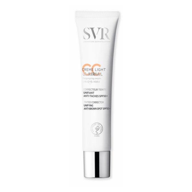 SVR Clairial CC Light Crème SPF50+ in a slim white tube with silver cap and orange text detailing anti-brown spot benefits.